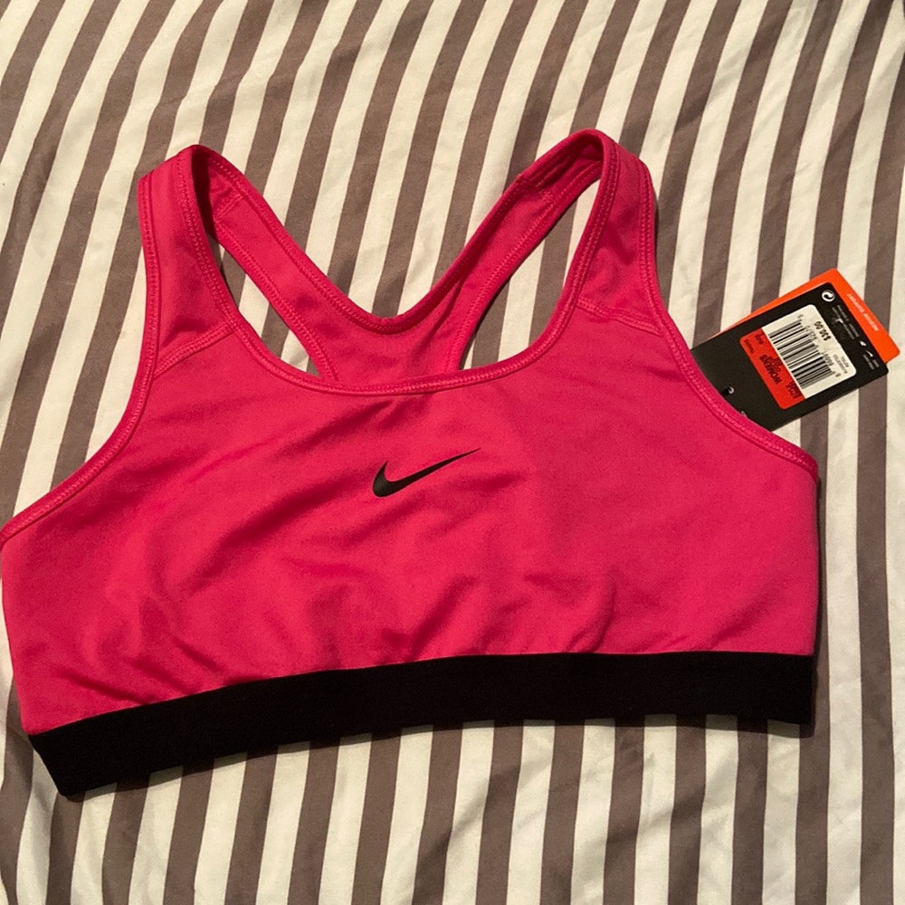 Nike dry fit sports bra. Size large. Pink and black.